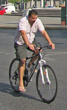 A cyclist in Athens, Greece at The Cheshire Cat Blog