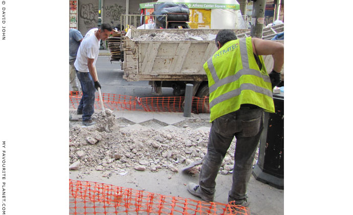 Athenian workers repairing Athinas Street, Athens at The Cheshire Cat Blog