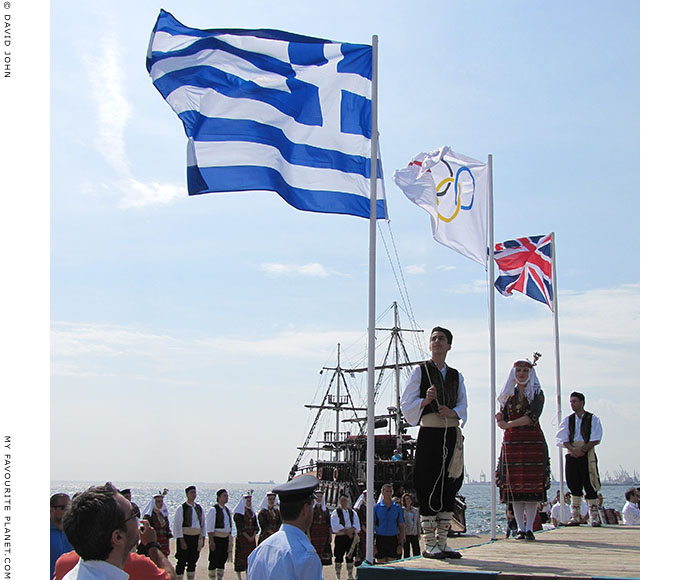 The British, Greek and Olympic flags flying during the 2012 Olympic flame ceremony in Thessaloniki, Greece, at The Cheshire Cat Blog