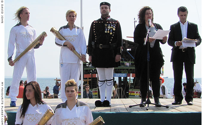A speech being given during the 2012 Olympic flame ceremony in Thessaloniki, Greece at The Cheshire Cat Blog