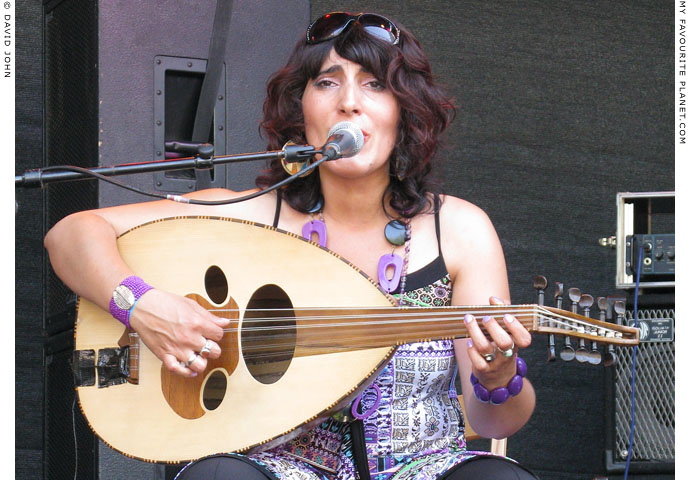 Sumeja Hiltmann of Sumeya Duo plays the oud at Weltfest am Boxhagener Platz, Friedrichshain, Berlin, by The Cheshire Cat Blog