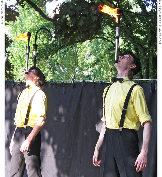 Duo Goidon juggle fire at The Cheshire Cat Blog