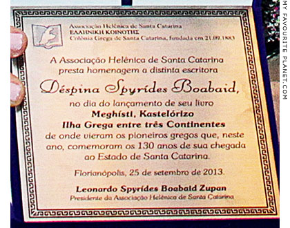 The honour plaque presented to Despina Spyrídes Boabaid during the book launch at The Cheshire Cat Blog