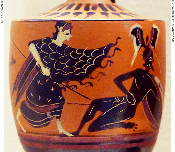 Athena fighting a Giant on a black figure lekythos at My Favourite Planet