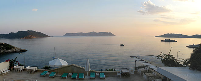 Panoramic view of the north coast of Kastellorizo island, Greece at sunset from Kas in Turkey at My Favourite Planet