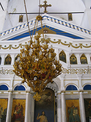 Candelabrum in front of the iconostasis of Agios Giorgos Tou Pigadiou church, Kastellorizo, Greece at My Favourite Planet