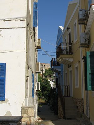 A narrow back street in Kastellorizo harbour, Greece at My Favourite Planet