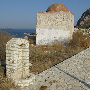 The hamam (Turkish bath) and a water fountain near the Knights' Castle, Kastellorizo, Greece at My Favourite Planet