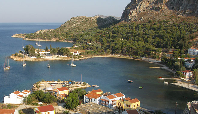 Agios Savvas church and the island's cemetry, Mandraki harbour, Kastellorizo, Greece at My Favourite Planet