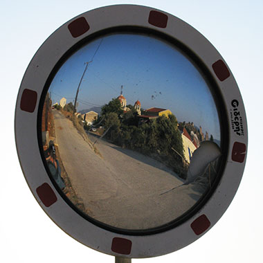 Agios Georgos tou Horafiou reflected in a roadside mirror, Kastellorizo, Greece at My Favourite Planet