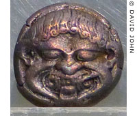 Coin of ancient Neapolis with a gorgon's head at My Favourite Planet