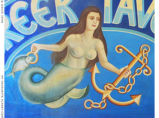 Greek mermaid with fish and anchor, Olympiada, Halkidiki, Macedonia, Greece at My Favourite Planet