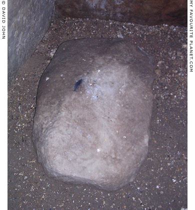 A sarsen stone on the floor inside West Kennet Long Barrow, Avebury, Wiltshire at My Favourite Planet