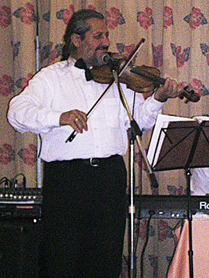 Turkish violinist, Kusadasi, Turkey at My Favourite Planet