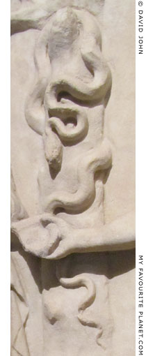 A snake entwined around a tree in the hero relief from Pergamon at My Favourite Planet