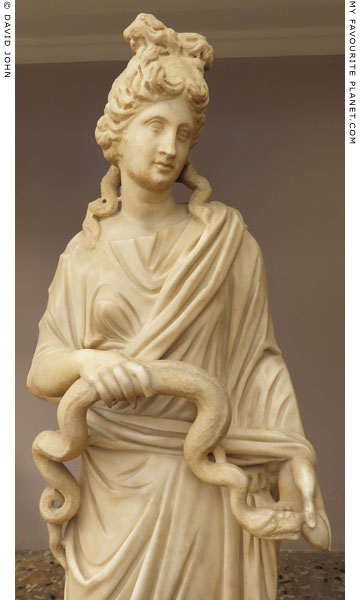Marble statue of Hygieia holding a snake and an egg in Kos at My Favourite Planet