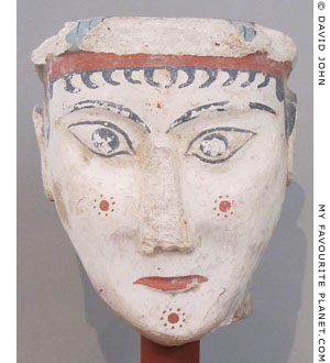 A painted plaster head of a woman from Mycenae at My Favourite Planet