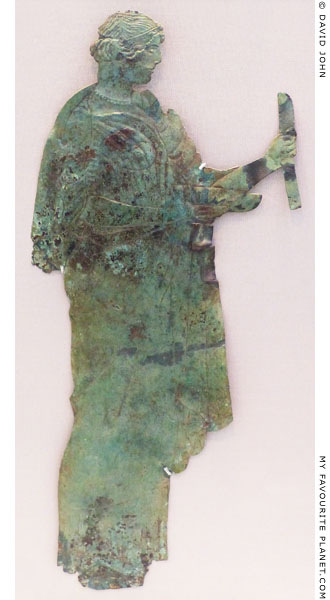 A hammered bronze sheet sheet in the form of a female figure at My Favourite Planet