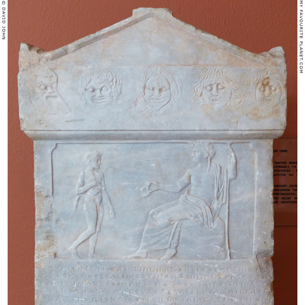 Inscribed stele with a relief depicting Dionysus and a Satyr at My Favourite Planet