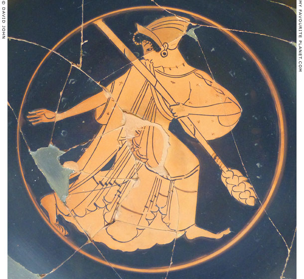 Detail of an Attic kylix depicting a Maenad holding a thyrsos at My Favourite Planet