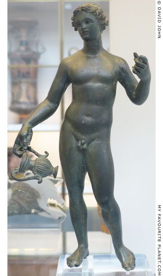 Bronze statuette of Dionysos holding a kantharos at My Favourite Planet
