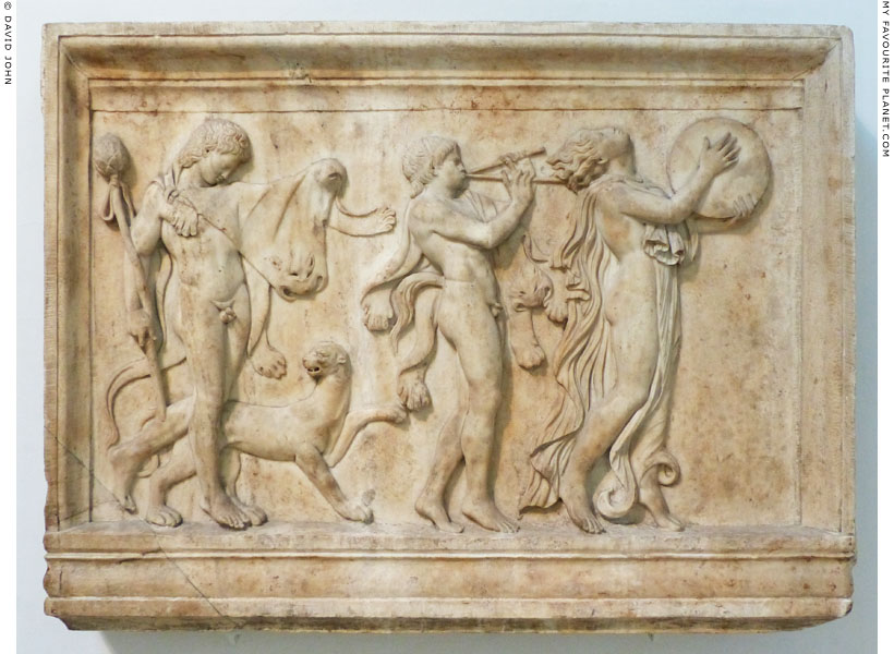 A marble relief with two Satyrs and a Maenad in a Dionysiac procession at My Favourite Planet