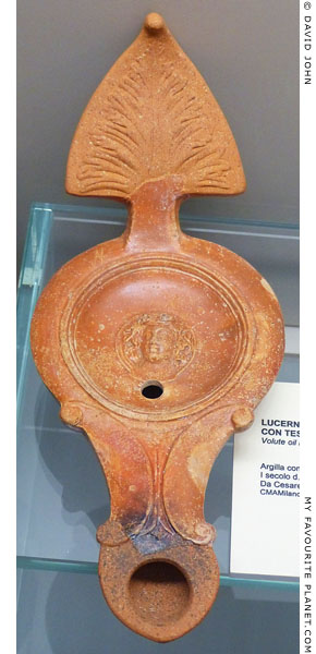 A terracotta lamp from Caearea with the head of Dionysus at My Favourite Planet