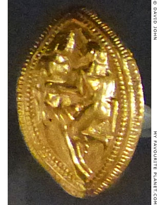 Etruscan gold ring showing a Satyr assaulting a Maenad at My Favourite Planet