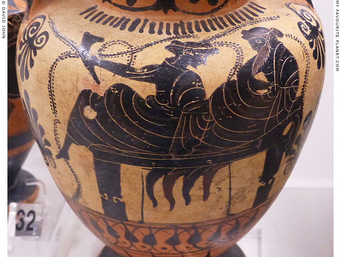 Attic black-figure amphora showing Dionysus and a female figure on a kline at My Favourite Planet