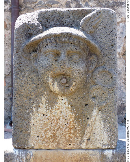 The winged head of Mercury as a water spout in Pompeii at My Favourite Planet