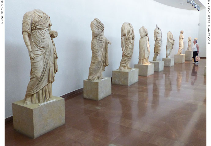 A row of statues from the Nymphaeum of Herodes Atticus, Olympia at My Favourite Planet