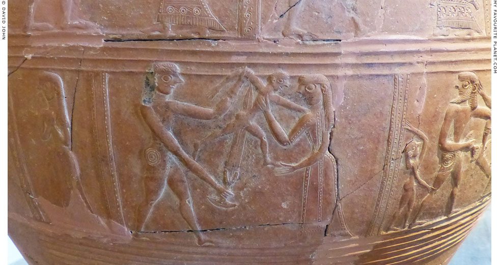 A Greek warrior killing a male child on the Mykonos Vase at My Favourite Planet