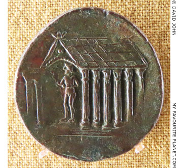 A god standing in a temple on a coin of ancient Korkyra at My Favourite Planet A god standing in a temple on a coin of ancient Korkyra at My Favourite Planet