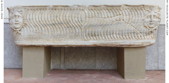 Lenos shaped marble sarcophagus with reliefs of Gorgon heads at My Favourite Planet
