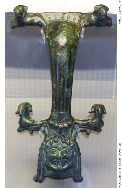 A Gorgoneion on an Archaic bronze hydria from Neraida, Elis, Greece at My Favourite Planet