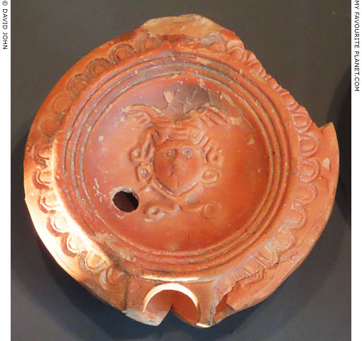 A Gorgoneion on a terracotta oil lamp from Thessaloniki at My Favourite Planet A Gorgoneion on a terracotta oil lamp from Thessaloniki at My Favourite Planet